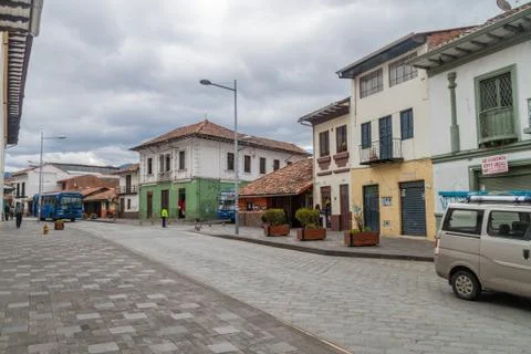 CUENCA, ECUADOR - JUNE 19, 2015: Street with old colonial buildings in the ce Stock Photos