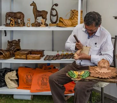 Cuenca, Ecuador - November 4, 2017 - Wood sculptor show his wares at the Cuen Stock Photos