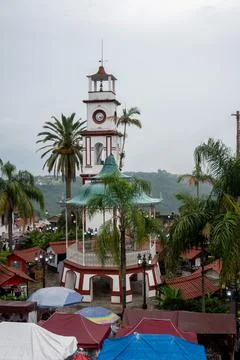 Cuetzalan Puebla central square featuring historic clock tower and ornate kiosk Stock Photos