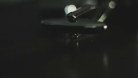 Cuff link from the shirt on a dark background Stock Footage 85318540