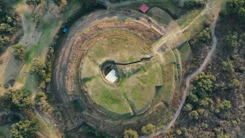 Cuicuilco Circular Pyramid, Epic Descent Drone View, Mexico, Ancient Ruin 4K Stock Footage 243702488