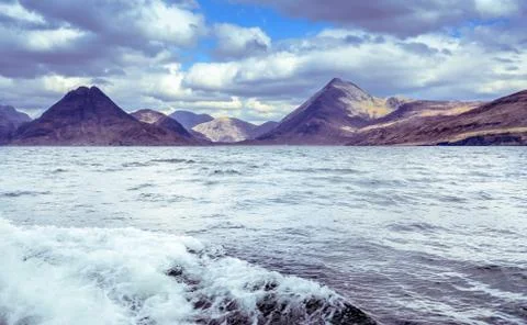 Cuillin mountain range seen from the boat - Isle of Skye Stock Photos