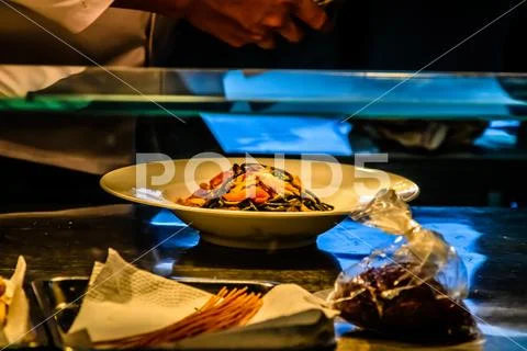 Cuisine being prepared in italian restaurant Stock Photos