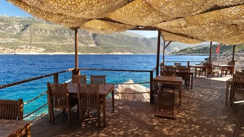 Cukurbag, Kas, Turkey - August 29, 2026 Empty cafe terrace Stock Footage 344879918