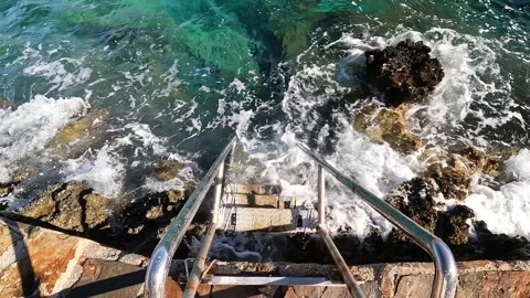 Cukurbag, Kas, Turkey - August 29, 2026 Sea ladder in storm Stock Footage 344879940