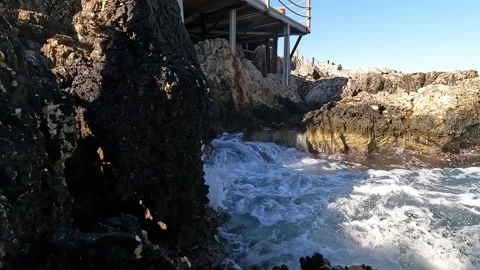 Cukurbag, Kas, Turkey - August 29, 2026 Waves hitting rocks Stock Footage 344880060