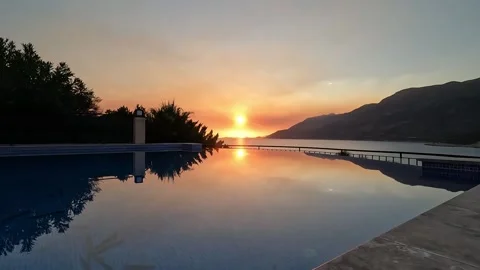 Cukurbag, Kas, Turkey - August 29, 2026 Sunset reflection in pool Stock Footage 345138478