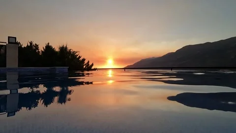 Cukurbag, Kas, Turkey - August 29, 2026 Sunset view from infinity pool Stock Footage 345138503