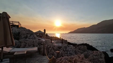 Cukurbag, Kas, Turkey - August 29, 2026 Sunset over the sea from terrace Stock Footage 345139218