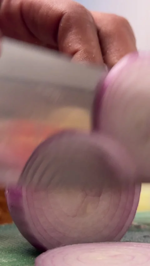 Culinary Arts Concept: Macro Video of Chef Cutting Red Onion Slices. Stock Footage 337186132