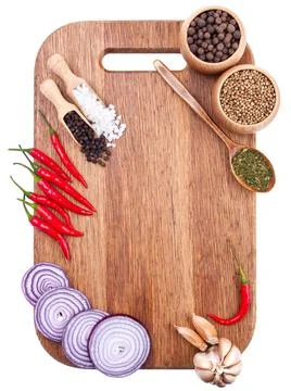 Culinary background with fresh vegetables on cutting board Stock Photos