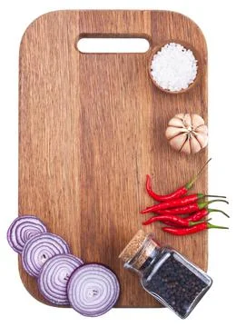 Culinary background with fresh vegetables on cutting board Stock Photos