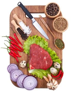 Culinary background with fresh vegetables on cutting board Stock Photos
