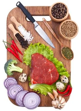 Culinary background with fresh vegetables on cutting board Stock Photos