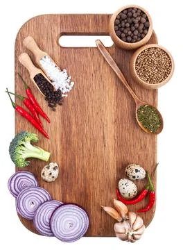 Culinary background with fresh vegetables on cutting board Foto stock