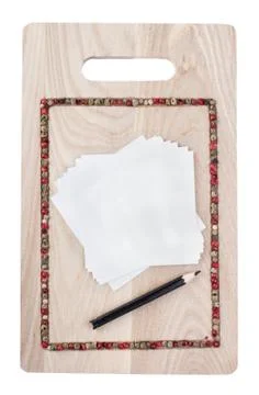 Culinary background with pepper on cutting board Stock Photos
