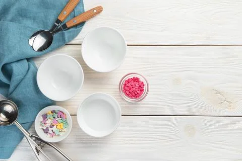 Culinary background with a set of empty dishes for dessert, ice cream. Stock Photos
