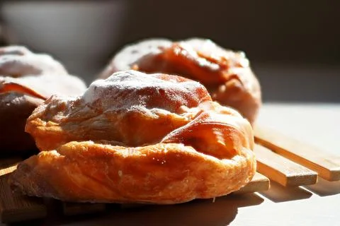 Culinary background of swirled buns Stock Photos