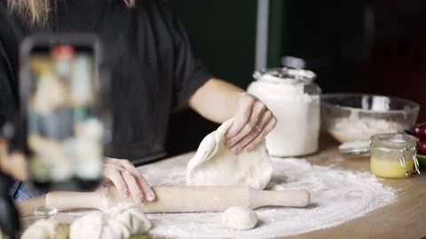 Culinary blogger performs cake preparation process Video stock 150088671