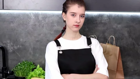 Culinary challenge unfolds in a modern kitchen with an aspiring chef Stock-Footage 296317249