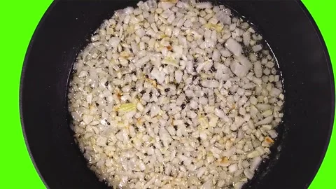 Culinary cooking concept. Finely chopped golden onion is fried in a pan. 스톡 동영상 204854674
