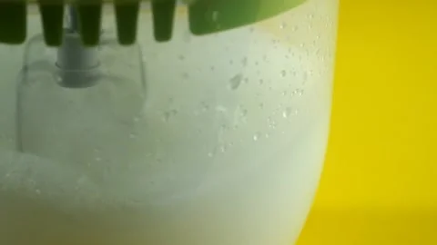 Culinary preparation. Beating the dough with a mixer Stock Footage 149146329