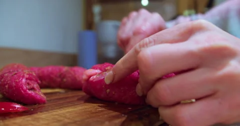 Culinary Preparation: Securing Stuffed Pork Roulades with Cooking Thread Stock Footage 347691218