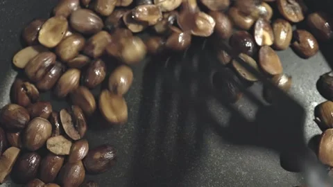Culinary Rhythms: The Art of Pan-Roasting Nuts Video stock 265783294