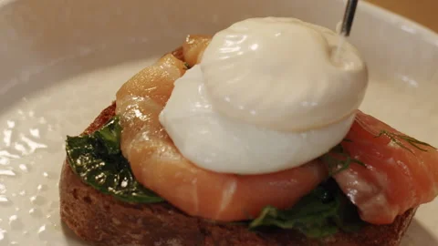 Culinary Whipping Siphon adds a delicate Parmesan mousse to the Benedict toast 스톡 동영상 150964134