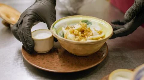 Culinary work serving meal dumpling chef kitchen Stock Photos