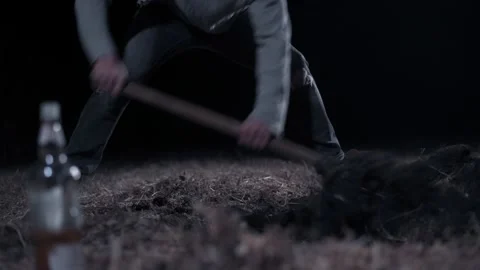 Culprit digs hole at night. Video stock 219551105
