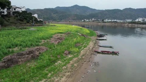 Cultivated Fields Beside Mountain Lake in Qiandao Lake, China Stock Footage 344038775