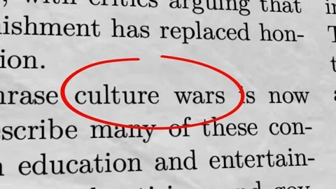 Culture Wars Highlighted in Newspaper Article Politics and Social Debate Concept Stock Footage 336101275