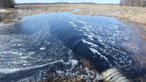 CULVERT WITH HIGH WATER RUSHING THROUGH Stock Footage 41752637