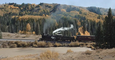 Cumbres and Toltec Rolling By the Pond Stock Footage 259686433