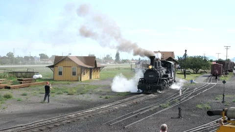 Cumbres and Toltec steam engine locomotive departing Antonito railway station Stockbeeldmateriaal 218585339