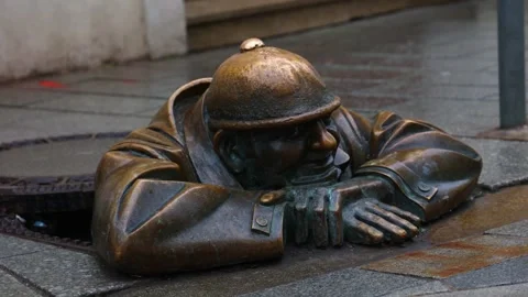 Cumil, the iconic man at work statue in Bratislava, Slovakia Stock Footage 303384202