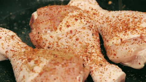Cumin on Raw Chicken Legs Stock Footage 148220655