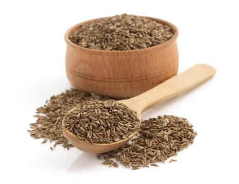Cumin seeds on white background Stock Photos