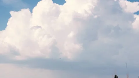 Cumulonimbus cloud and blue sky. Beautiful summer cumulonimbus cloud flowing Stock Footage 252129189