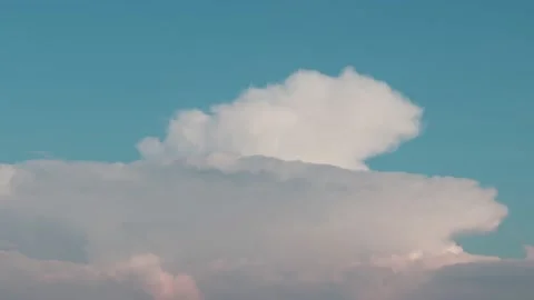 Cumulonimbus cloud at sunset Stock Footage 239845292