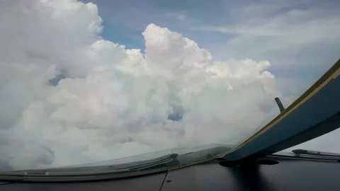 Cumulonimbus clouds from planes view Stock Footage 231658062