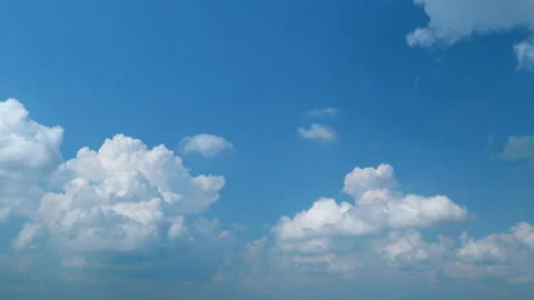 Cumulonimbus grow before thunderstorm explodes air cloud on summer blue sky 動画素材 209596048