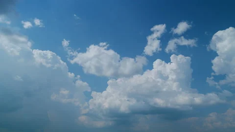 Cumulonimbus grow before thunderstorm explodes air cloud on summer blue sky 動画素材 209619082