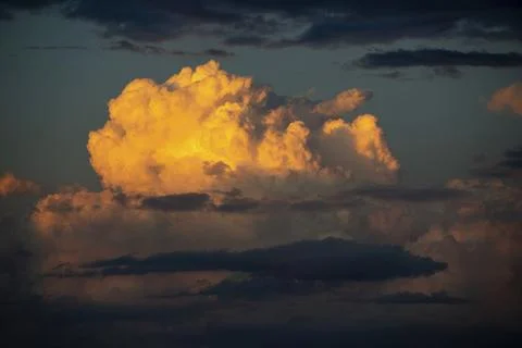 Cumulonimbus thundercloud at sunset with dramatic sky in front of a thunderstorm 스톡 사진