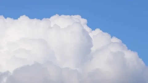 Cumulonimbus white clouds on blue sky Stock Footage 239845461