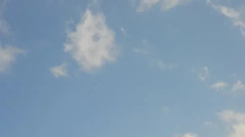 Cumulus and cirrus clouds move quickly on background of blue sky Stock Footage 50057873