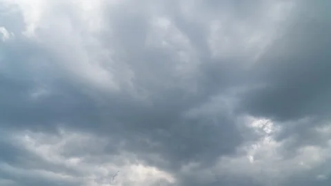 Cumulus and cirrus clouds move rapidly in the sky. Time lapse. Vídeos de archivo 133707265