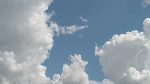 Cumulus and cirrus clouds move rapidly in the sky. Time lapse Video stock 280345259