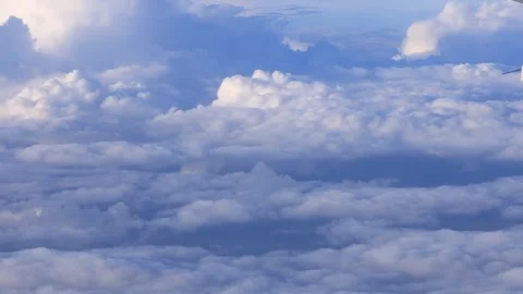 Cumulus beautiful clouds from the airplane window Stock Footage 246434859
